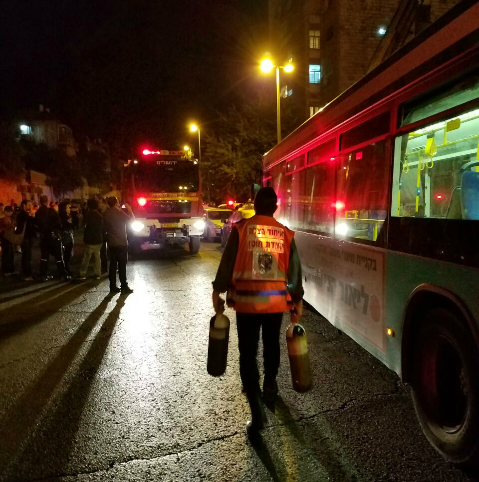 A Psychotrauma and Crisis Response Unit Member treats victims of shock following Jerusalem building fire resized