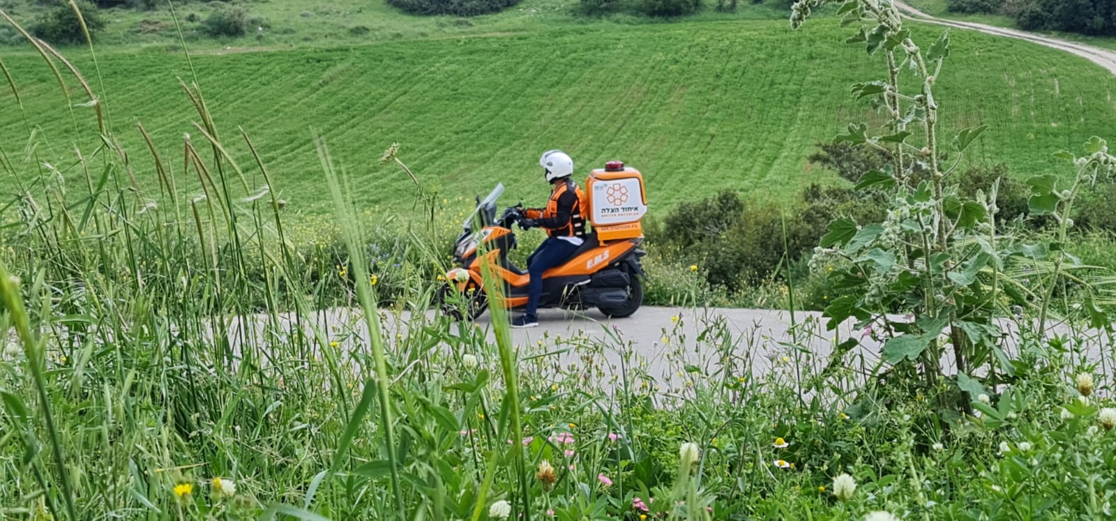 A United Hatzalah ambucyclist responding to an emergency in the Galilee illustration 1