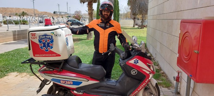 Ariel with his ambucycle at the cemetery
