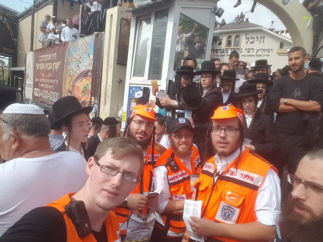 Avi Tennenbaum on duty center right with other responders outside the gravesite of Rebbe Nachman 1