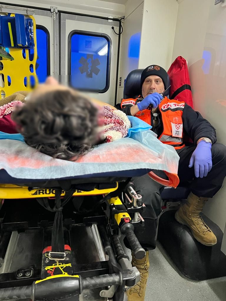 Dr. Zev Neuwirth with one of the patients in transport 1