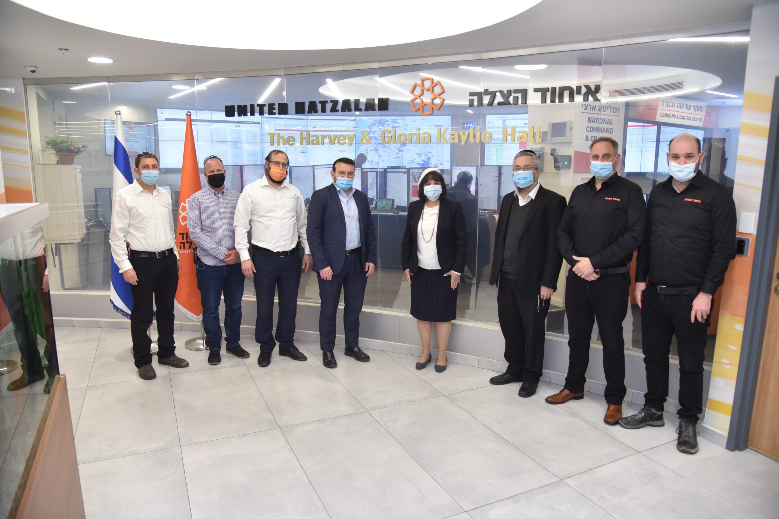 Mayor Dr. Bloch together with United Hatzalah staff in their headquarters 1 scaled