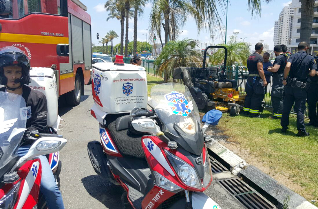 Scene of burning lawnmower
