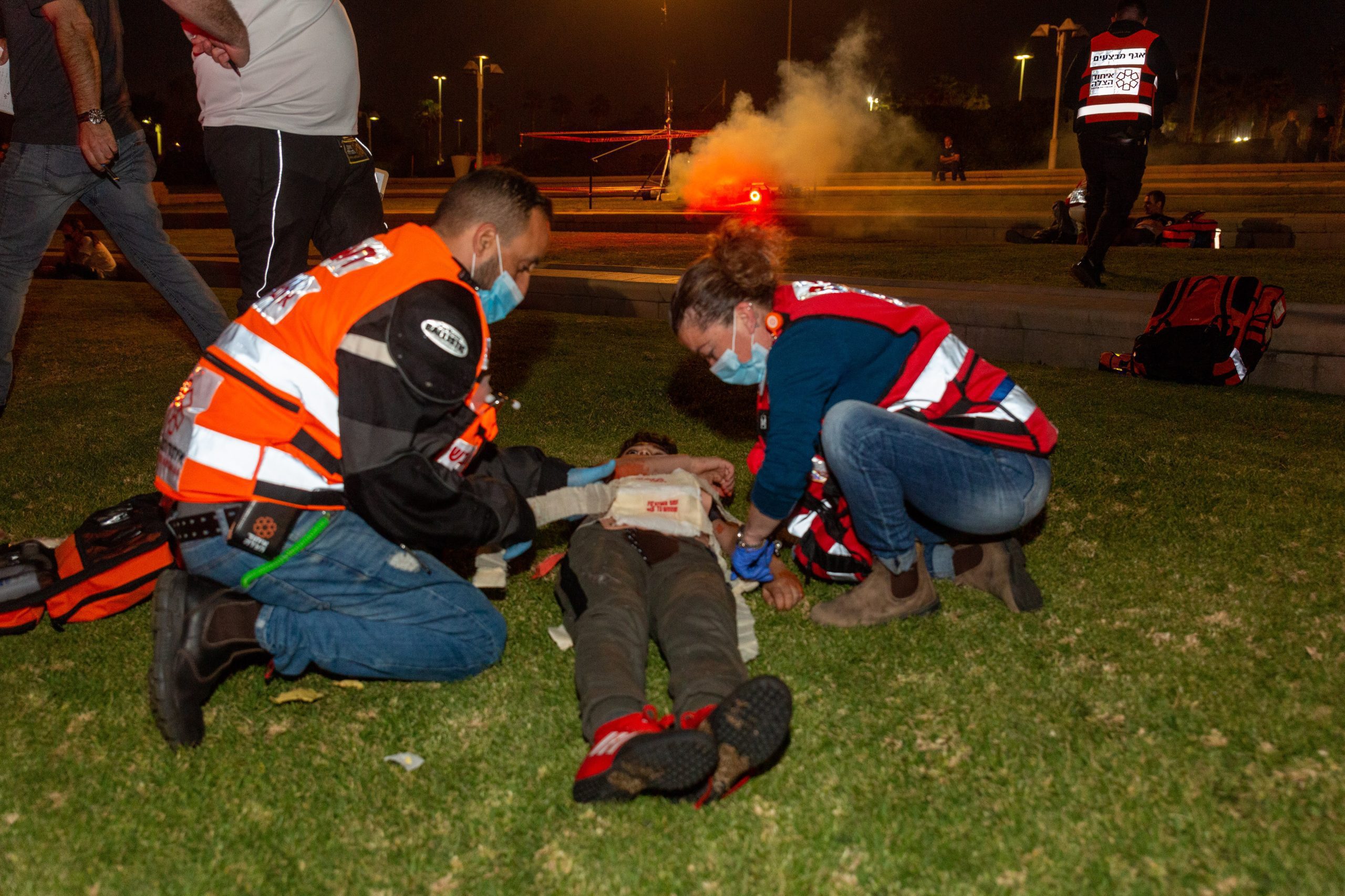 United Hatzalah volunteers treating a young boy at a recent training drill illustration 1 scaled