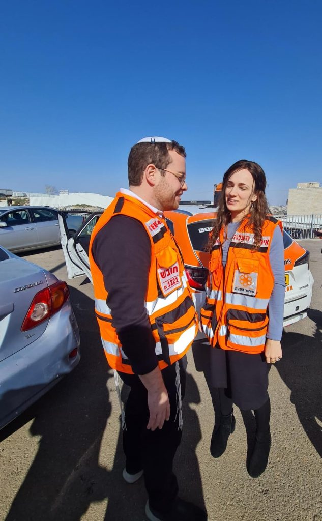 Dovi and Batya Widawsky at the scene of the Ramot terror attack 633x1024 1