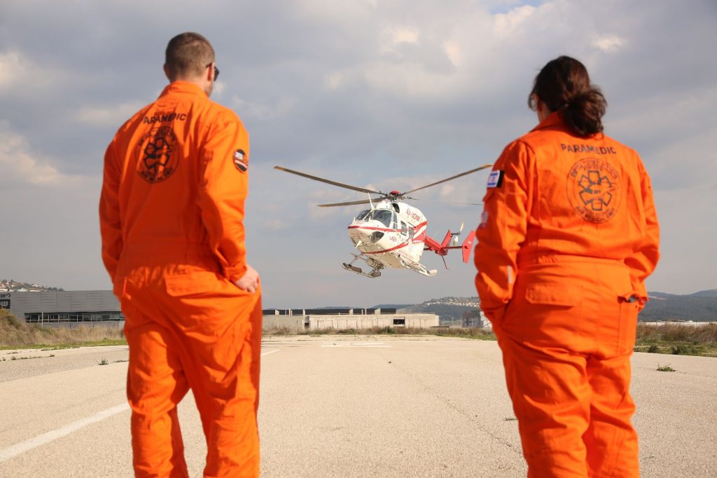 Flight paramedics look on as one of the helicopters lands 1024x682 1