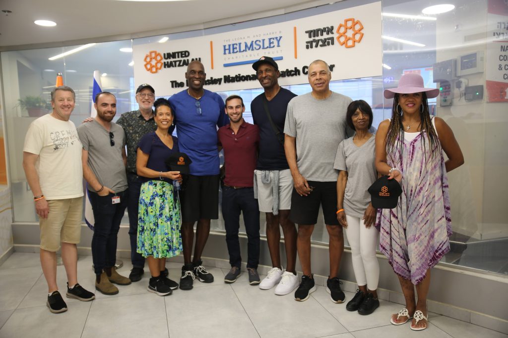 Mark West and Eddie Johnson center together with family members United Hatzalah staff and Athletes for Israel Board Member Eric Rubin left 1