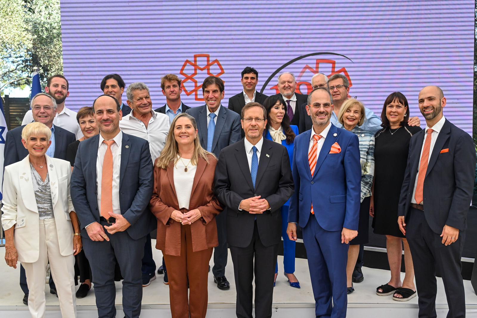 President Herzog and Michal Herzog stand with the honorees during the ceremony
