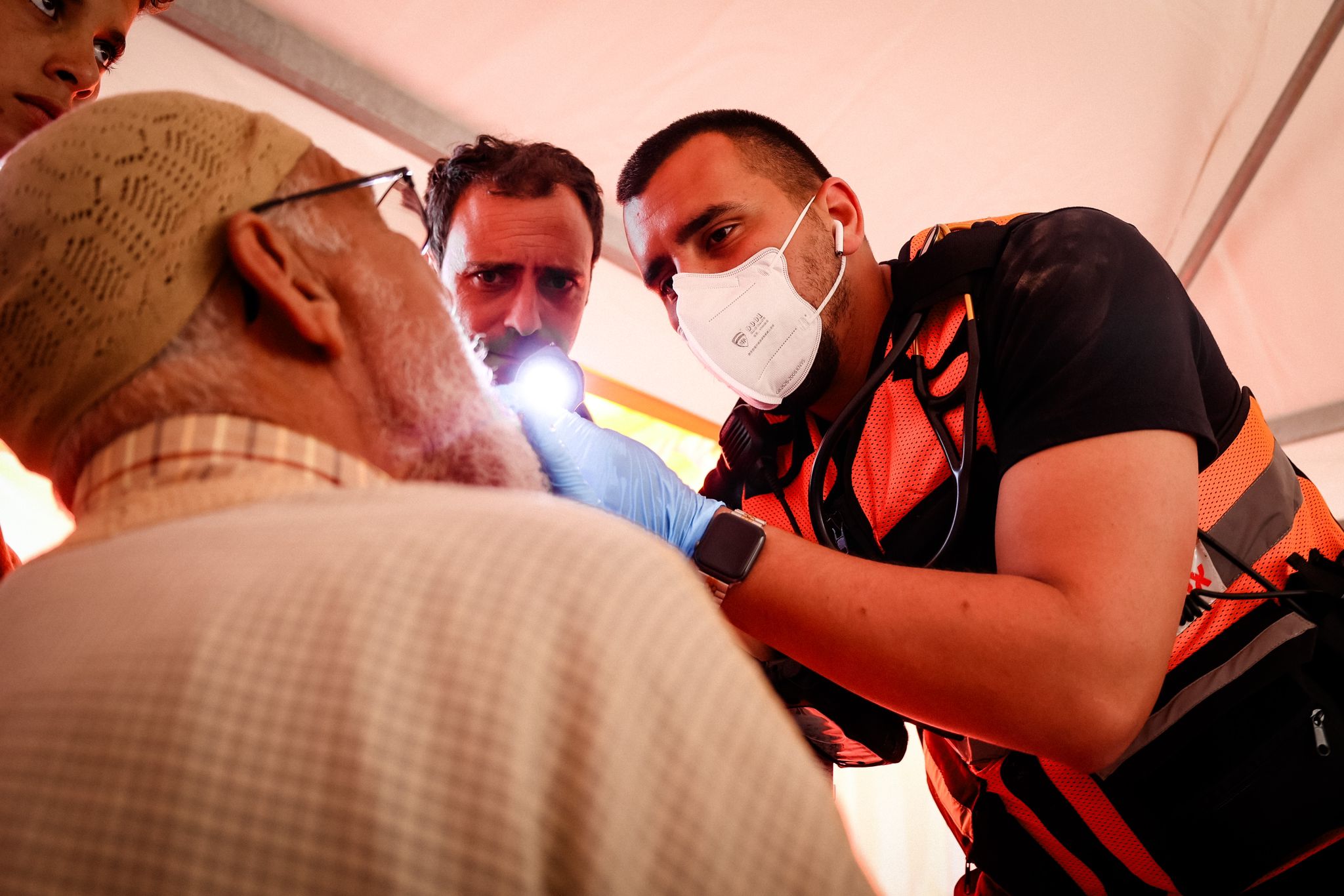 Dr. Fahkry and another EMT treating a man in Morocco after the earthquake