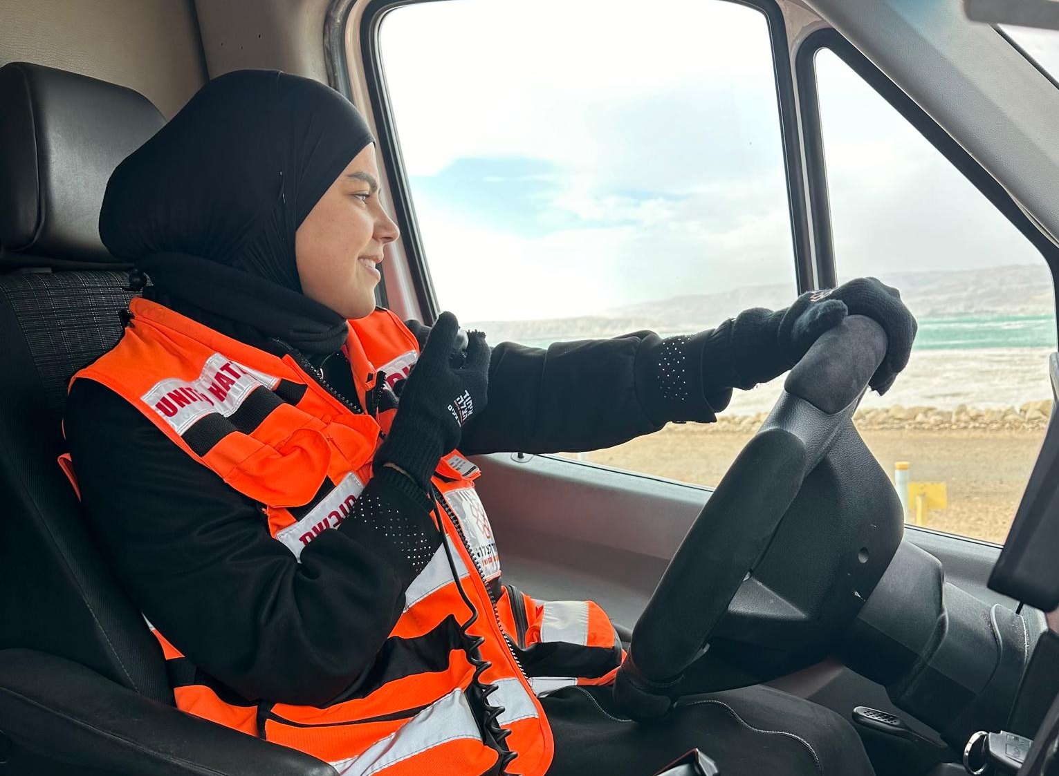 Al Aubra driving in ambulance Photo credit United Hatzalah