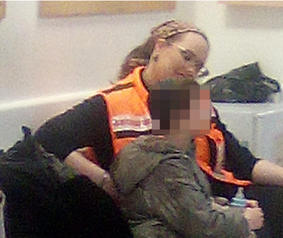 Efrat Scheinberger with boy at hospital